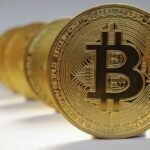 Bitcoin tops $100,000 on trade deal optimism
